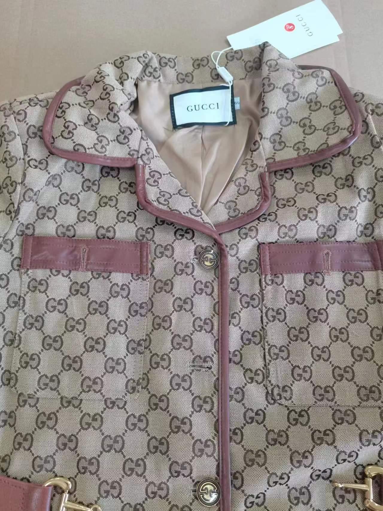 Gucci Women’s monogram trench coat